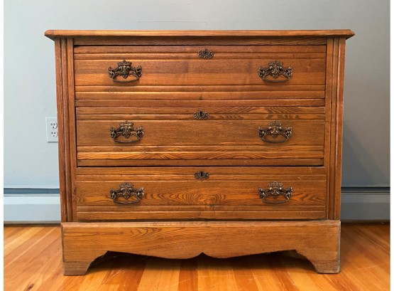 An Antique Oak Chest Of Drawers