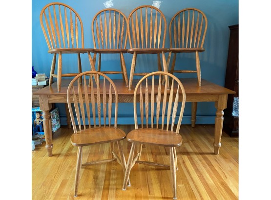 A Set Of Six Solid-Oak Windsor Chairs