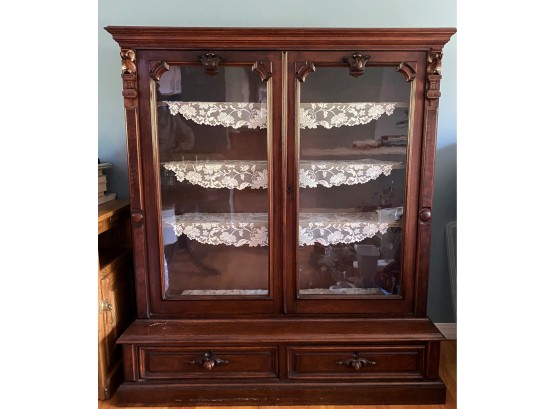 An Antique Two-Piece Display Cabinet