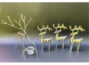 A Small Herd Of Silver Reindeer