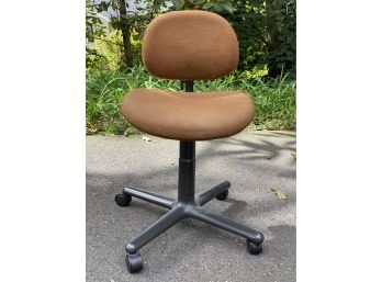 A Mustard Toned, Armless Desk Chair