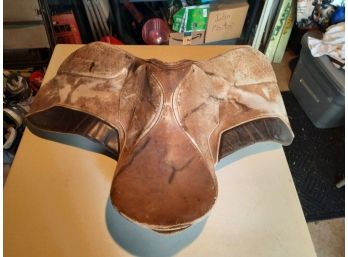 Tan Leather English Saddle Used And Worn But Would Be Good For Beginner Or For Riding School.