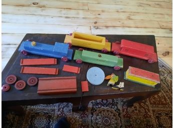 Vintage 1950s PLAYTOY Brand 4-piece Wooden Train Set In Very Good Condition.
