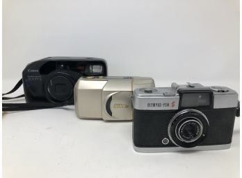 A Trio Of 35mm Cameras - Canon, Nikon, Olympus