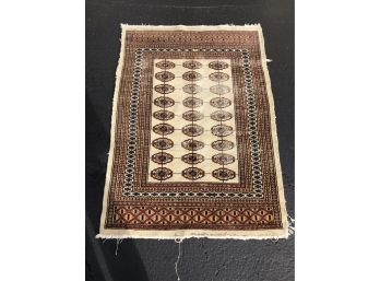 A Worn Hand Knotted Persian Wool Rug 32x46