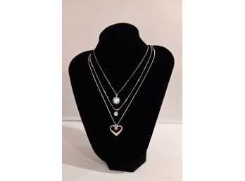 Three Sterling Silver Necklaces With Pendants