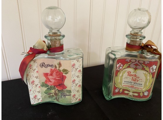 A Pair Of Perfume Bottles By E. Dean Designs.