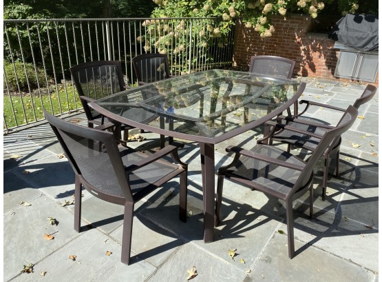A Brown Jordan Glass Top Aluminum Patio/outdoor  Table With Six Chairs