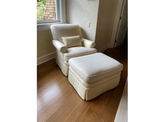 A Classic White Upholstered Club Chair With Ottoman