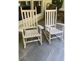 A Pair Of Vintage White Rocking Chairs