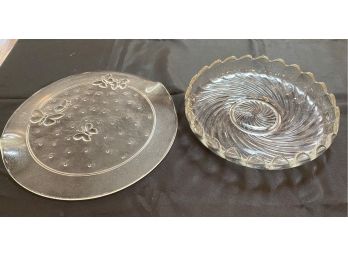 A Set Of Two Glass Serving Platers