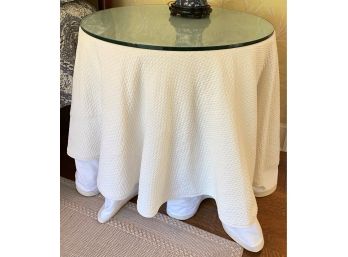 A Double Skirted Round Table Nightstand With  Glass Top