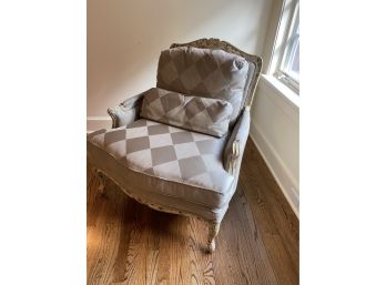 A Custom Made Upholstered Diamond Pattern Bergere Chair