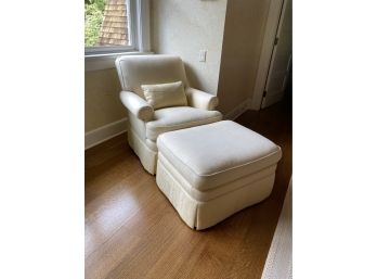A Classic White Upholstered Club Chair With Ottoman
