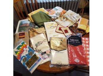 Lot Of 11 Tablecloths- Most Are New In Original Packaging, 16 Linen Napkins, 4 Placemats