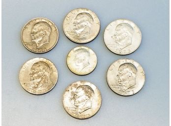 Five Large Eisenhower Dollar Coins & One Kennedy Half Dollar Coin 1967, 1971, 1973, 1976 & 1978