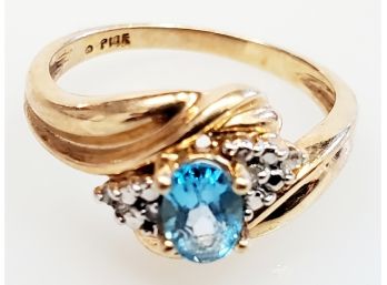 Lovely Ladies 10K Yellow Gold, Oval Blue Topaz & Diamond Size 7 Ring