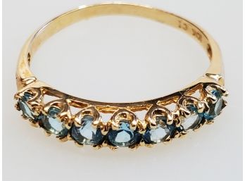 Cute 10k Yellow Gold & Blue Topaz Channel Band - Size 7.5