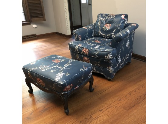 An Antique Chair And Ottoman Upholstered In Waxed Chintz
