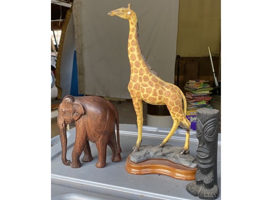 Carved Elephant, Tiki Man, And Giraffe