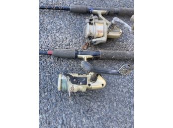 Two Gold Reel Fishing Rods