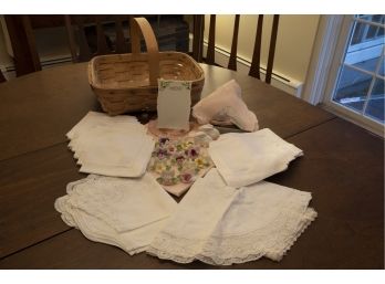 Basket Of Lace Linens And Decor