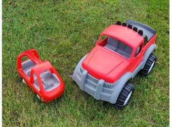 2 Red Toy Trucks
