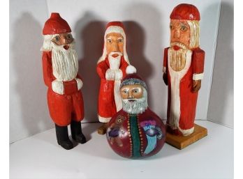 Three Handcarved Wood Christmas Figures And A Santa Gourd