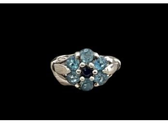 Sterling Silver Blue Topaz And CZ Floral Ring