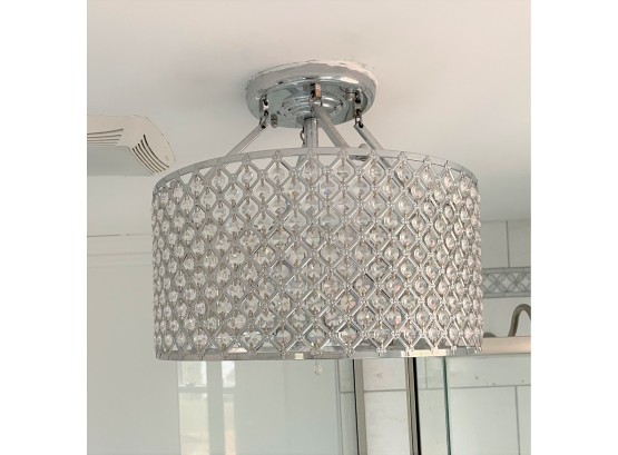 A Ceiling Mounted Round Chandelier With Beaded Drum & Glass Teardrops
