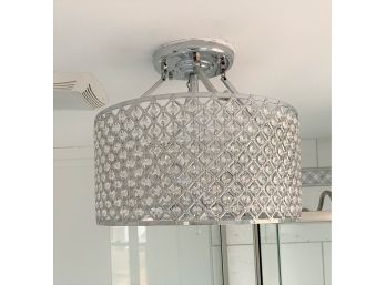 A Ceiling Mounted Round Chandelier With Beaded Drum & Glass Teardrops