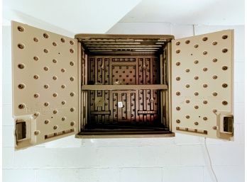 A Suncast Wall Mount Storage Cabinet