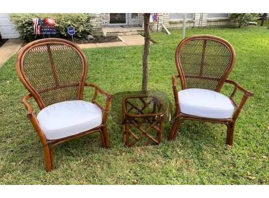 Pair Of Rattan Arm Chairs With Glass Top Table
