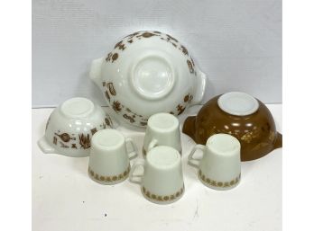 Pyrex Bowls And Four Pyrex Mugs