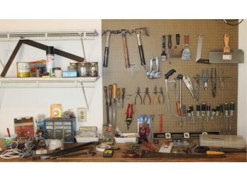 Table Full Of Hardware With Hammers, Chisels, Saws, Screwdrivers, Pliers, Levels And So Much More