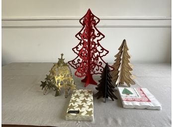 Assortment Of Decorative Christmas Trees And Holiday Napkins