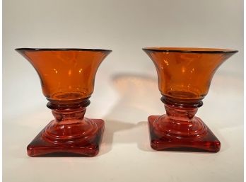 Pair Of Orange Glass Urns
