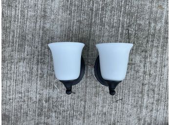 Pair Of Black Wall Sconces With White Frosted Glass Shades