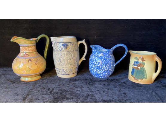 Four Lovely  Ceramic Pitchers