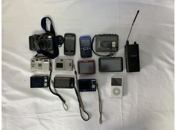 Mixed Lot Of Electronics - Phones , GPS , Camera , Radio , Mp3