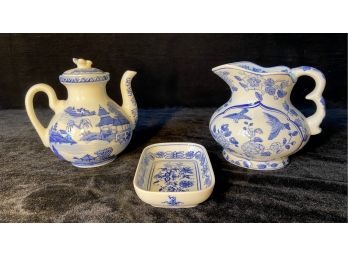 Blue And White Porcelain Teapot, Pitcher And Dish