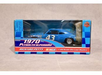 Autographed  1999 Racing Champions Richard Petty #43 Plymouth Superbird 50th Anniversary 1:24 Diecast