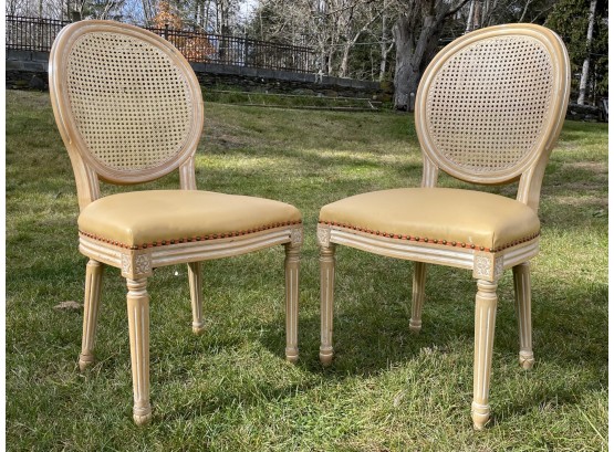 A Pair Of Louis XVI Style Balloon Back Side Chairs With Leather Seat And Cane Back