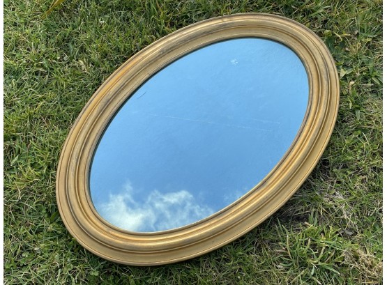A Vintage Oval Mirror In Gilt Wood Frame