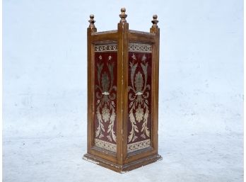 An Antique Umbrella Stand With Reverse Glass Panels