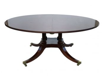A Large, Extendable Banded English Mahogany Regency Reproduction Dining Table