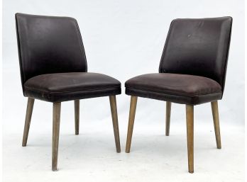 A Pair Of Modern Leather And Oak Side Chairs