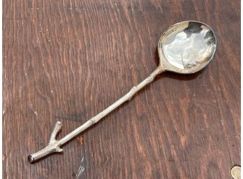 A Large Silver Alloy Serving Spoon By Michael Aram