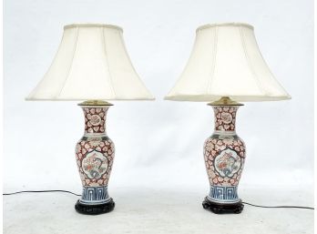 A Pair Of Asian Ceramic Lamps On Rose Wood Bases