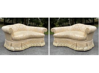 A Pair Of Skirted Upholstered Kidney Form Sofas - As Is